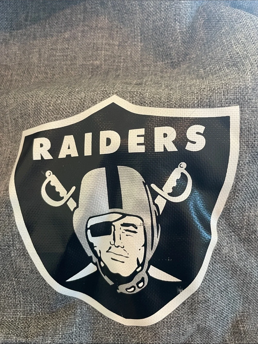 Northwest Gray Duffel Bag with Black Straps and Raiders Logo